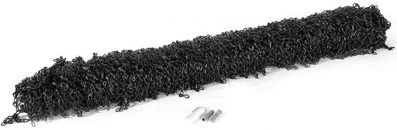 An aluminum chain link curtain hanging in a doorway